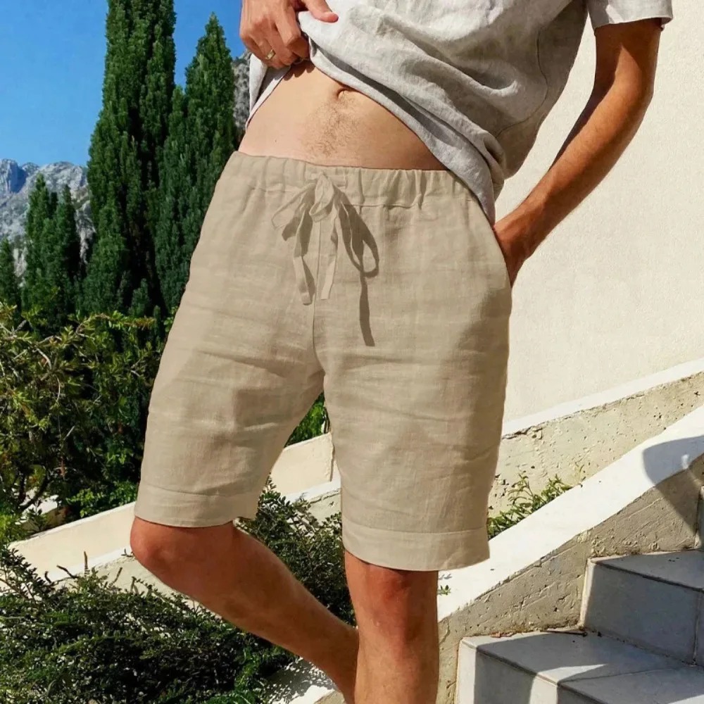 夏の新メンズコットンリネン通気性ショーツハワイビーチパンツ男性ソリッドカラーのズボン緩い多用途ストリート