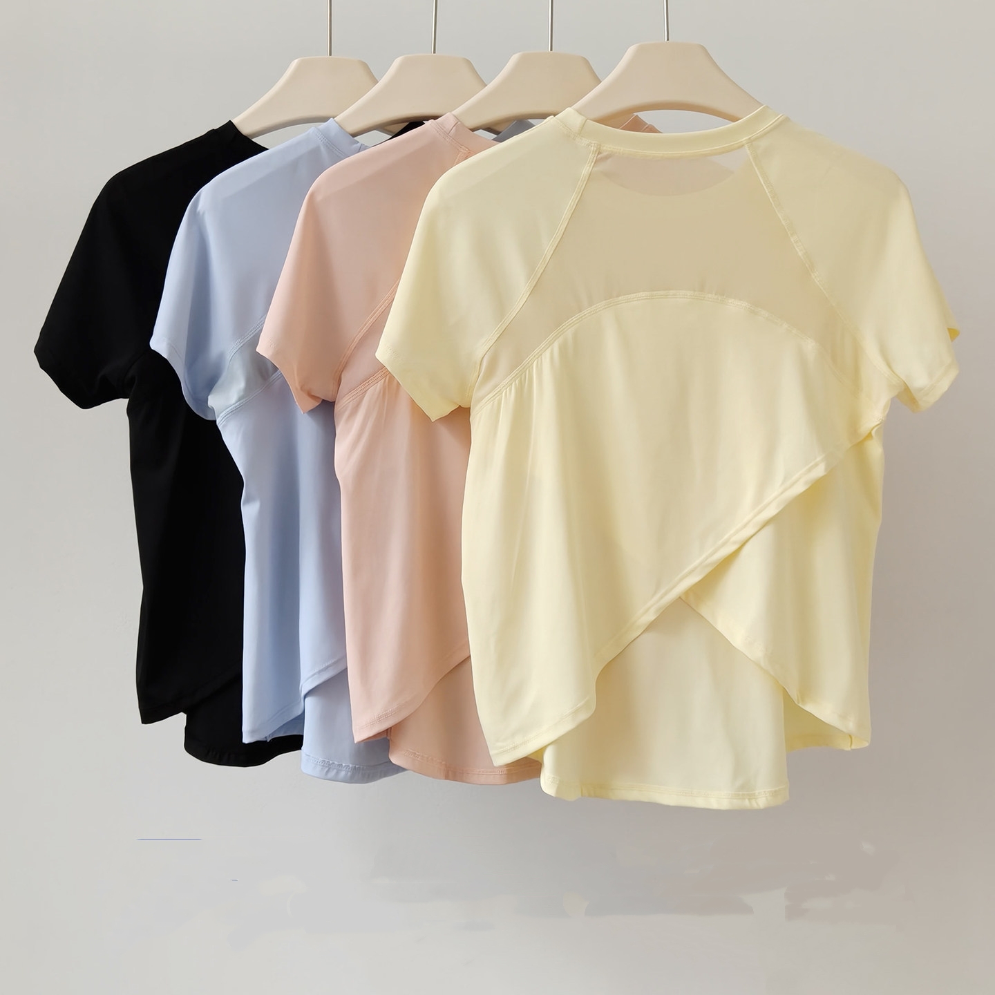ヨガ服半袖女性のルーズスポーツトップメッシュランニング速乾性フィットネス服アウトドアトレーニングピラティス Tシャツ