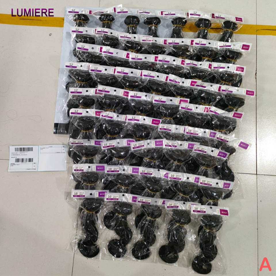 18A 100% バージン生ボディウェーブ人毛バンドル取引ジェリーカーリーヘアバンドルブラジルのウェットとウェーブのかかった髪織り Hir エクステンション