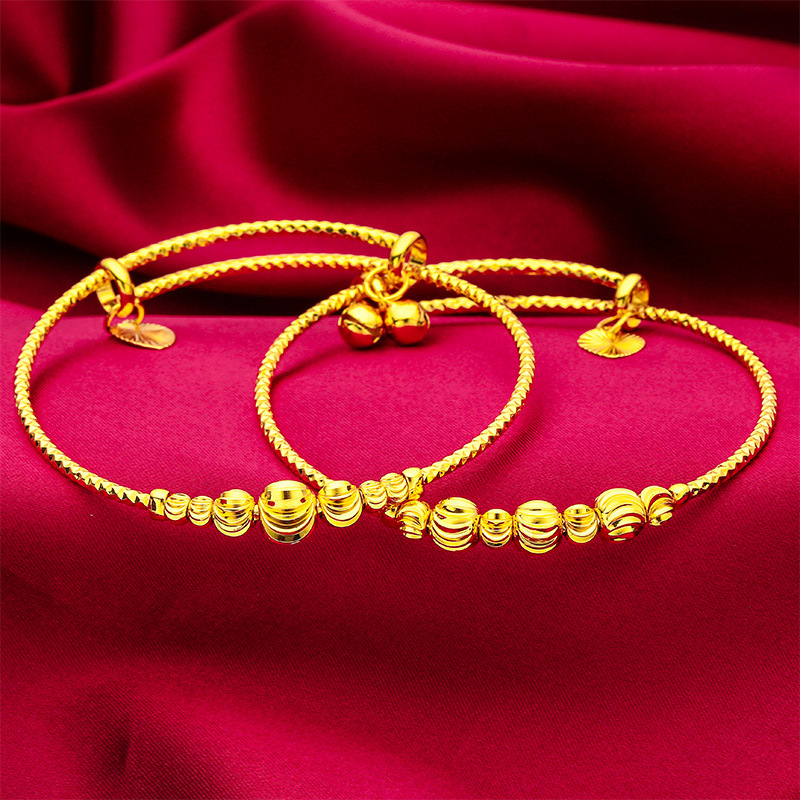 24K ゴールドの調節可能なビーズ ブレスレット | AU999 フルゴールドの丸いゴールド ビーズが、生き生きとした手首の風景に組み込まれています。