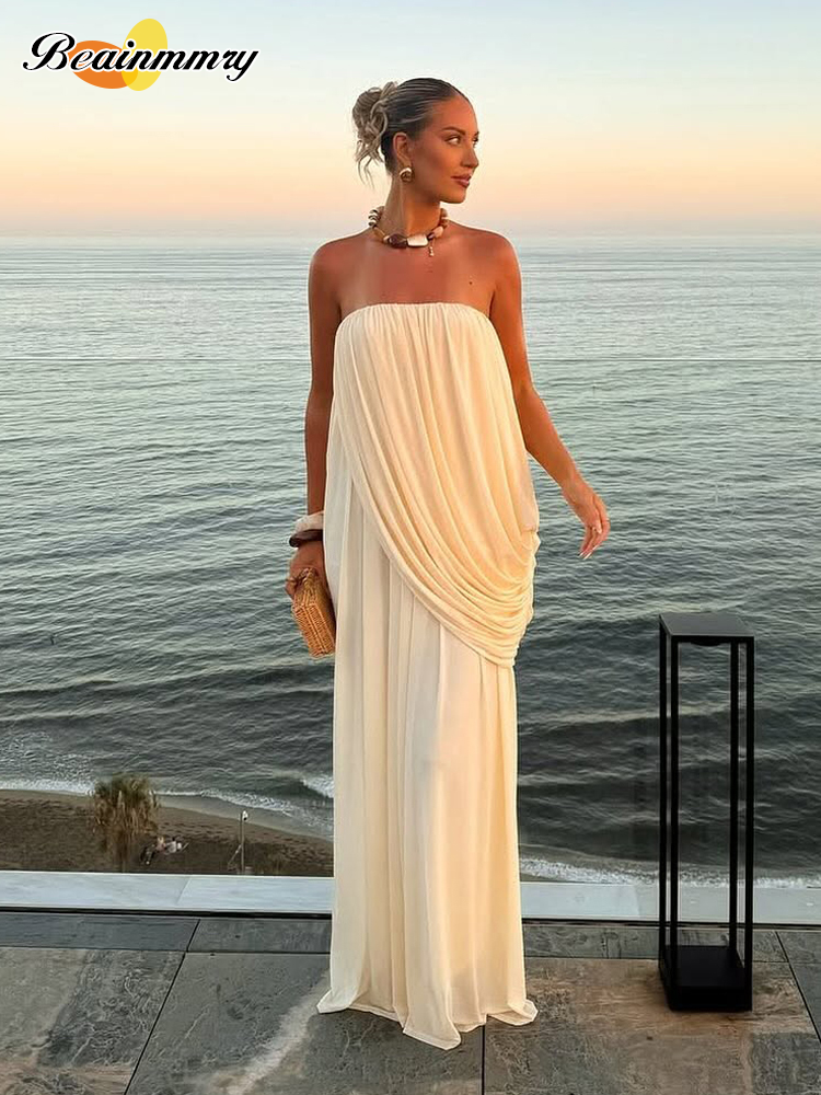 セクシーなプリーツストラップレスマキシドレス女性シックな固体ノースリーブ背中の開いたルーズロングドレス 2026 夏の女性の休暇ビーチ衣装