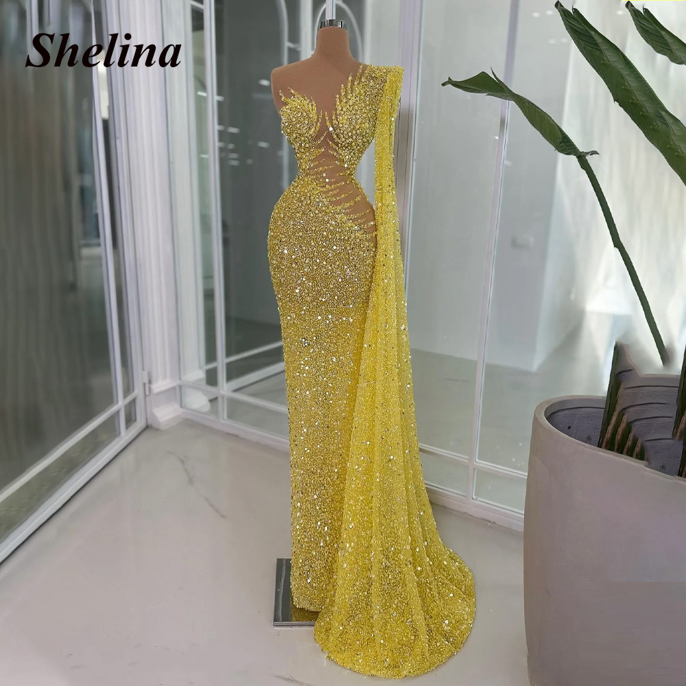 Shelina キラキラスパンコールイブニングドレスワンショルダー O ネックトランペットイリュージョンページェントパーティードレス Vestidos デ ガラカスタマイズ