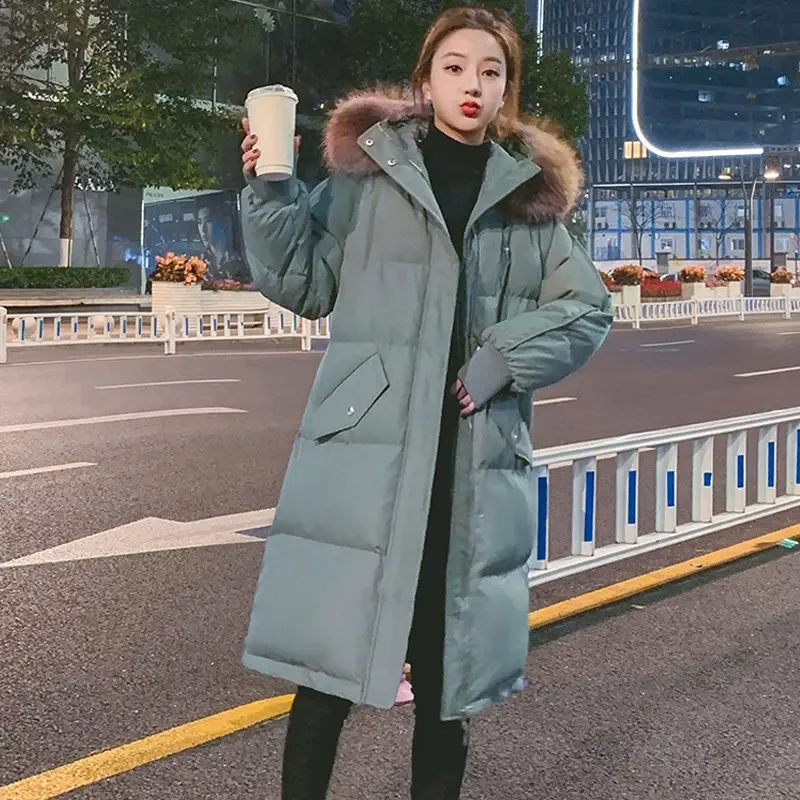 2025 女性の緩いパッド入りロングパーカー、厚い冬コート、暖かいジャケット、女性生き抜く冬コート女性パーカー
