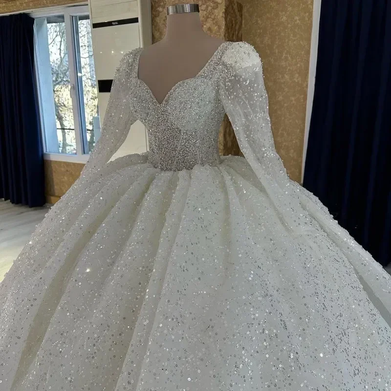 カスタマイズされた高級絶妙な夜会服のウェディングドレス 2025 恋人ネック長袖 Vestido デレーススパンコールローブデ