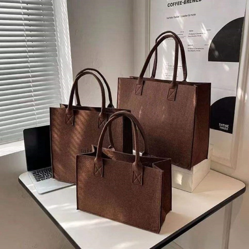 卸売/100ピースロットカスタムロゴプリント大容量フェルトトートバッグポータブルハンドバッグ再利用可能なストレージショッピングギフトバッグ