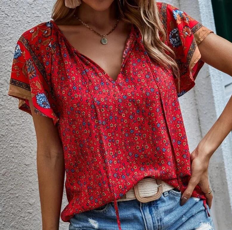 夏の花柄ブラウス女性のファッション V ネック半袖自由奔放に生きるビーチカジュアルトップス女性のエレガントなシャツ新しい Womenes