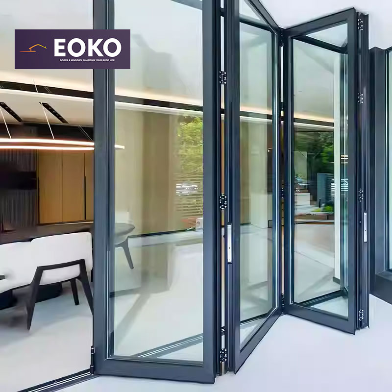 カスタム EOKO バイオ折りたたみドアガラス格納式折りたたみドアアルミ二つ折りドアブラインド