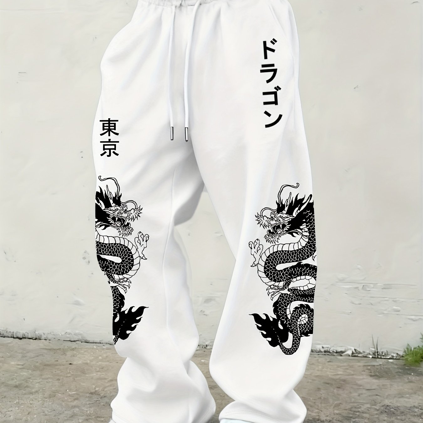 早春日本のストリートスタイル東京ドラゴン柄パンツ日本のドレイモーンプリントゆったりメンズとレディースカジュアルパンツ
