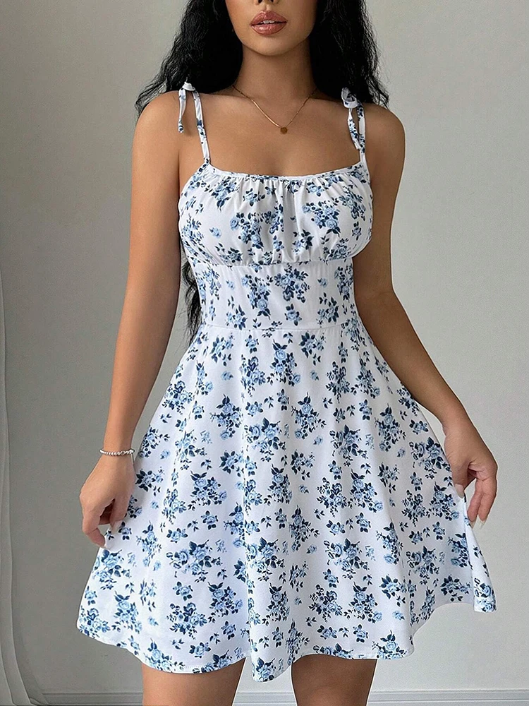 女性の夏の花柄スパゲッティ ストラップ ビーチ ショート ドレス、レディース ドレス、女性服、女性服、サンドレス、ドレス 2025 の新
