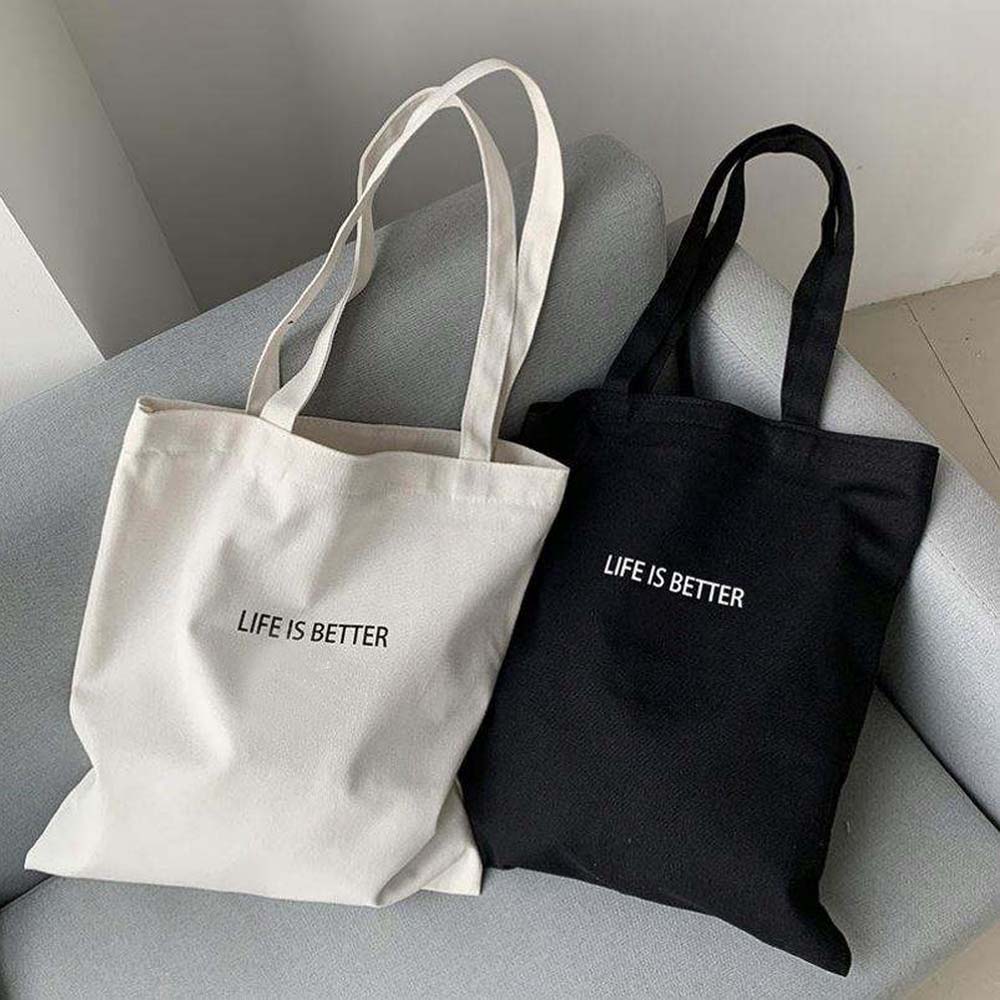 卸売 100 個カスタムロゴコットンキャンバストートバッグ、長いハンドル付き、ギフト用の再利用可能な環境に優しいショッピングバッグ