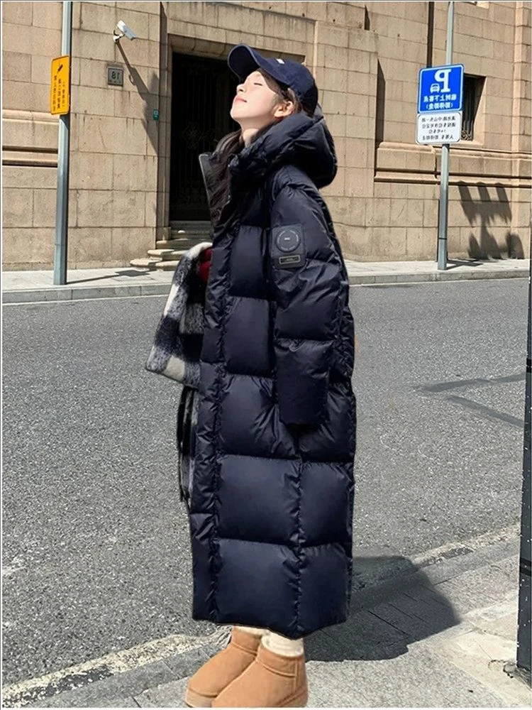 女性の冬暖かい厚い綿コート 2025 新しい女性ミッドレングス綿パッド入りジャケット韓国ルーズフード付きパーカーコート女性生き抜く