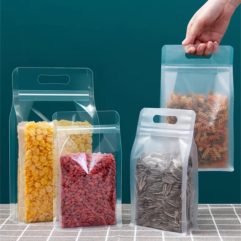 50 個の食品包装ジップロックバッグ透明ハンドル付きスタンドアップシールキャンディナッツの保管用再利用可能なジップロックポーチ