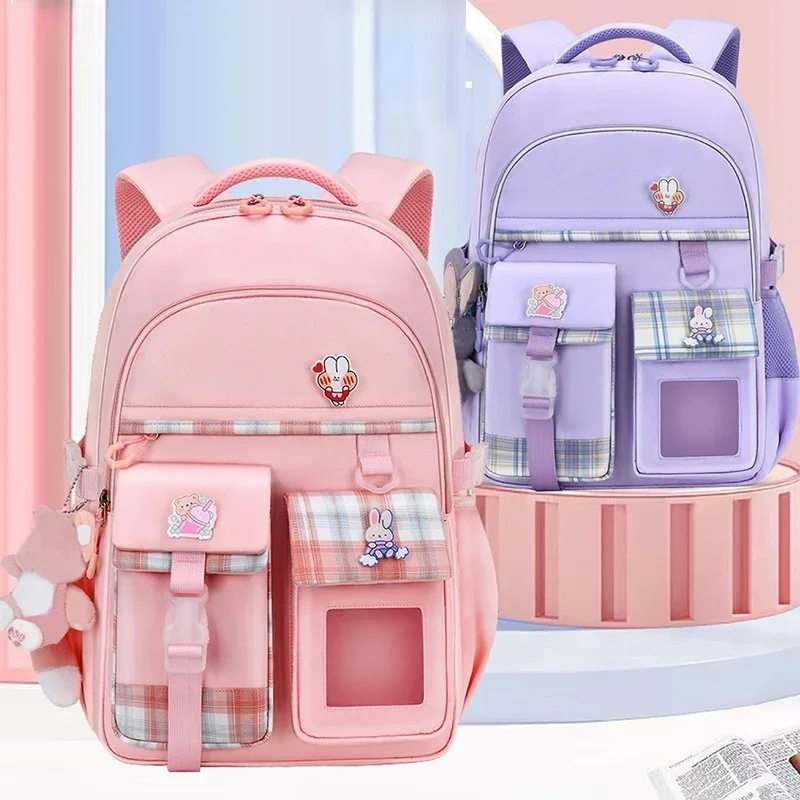 新しいタイプの軽量バックパック小学生女子子供のバックパック大容量脊椎保護卸売防水