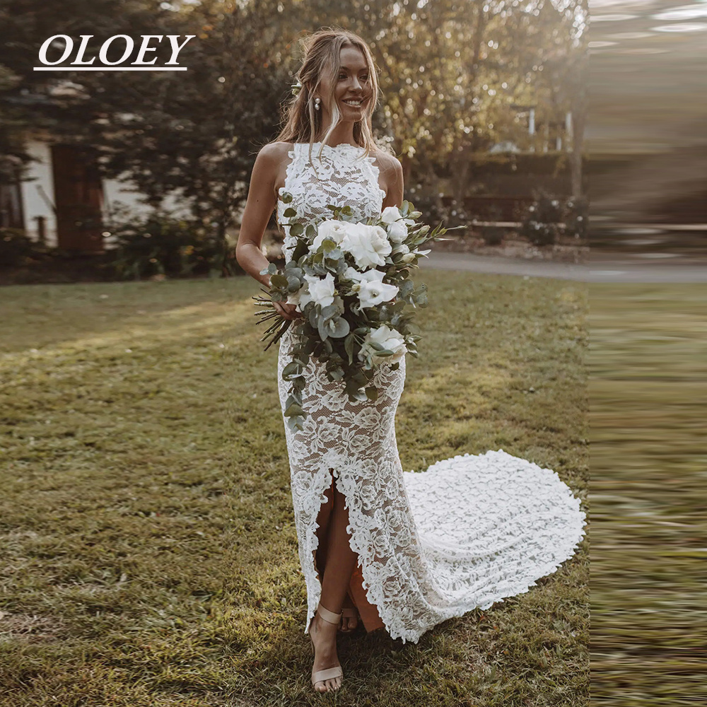 OLOEY 絶妙なレース自由奔放に生きるウェディングドレスボートネックサイドスプリットセクシーなイリュージョンブライダルドレスカスタマイズ Vestidos デノビアロングテール