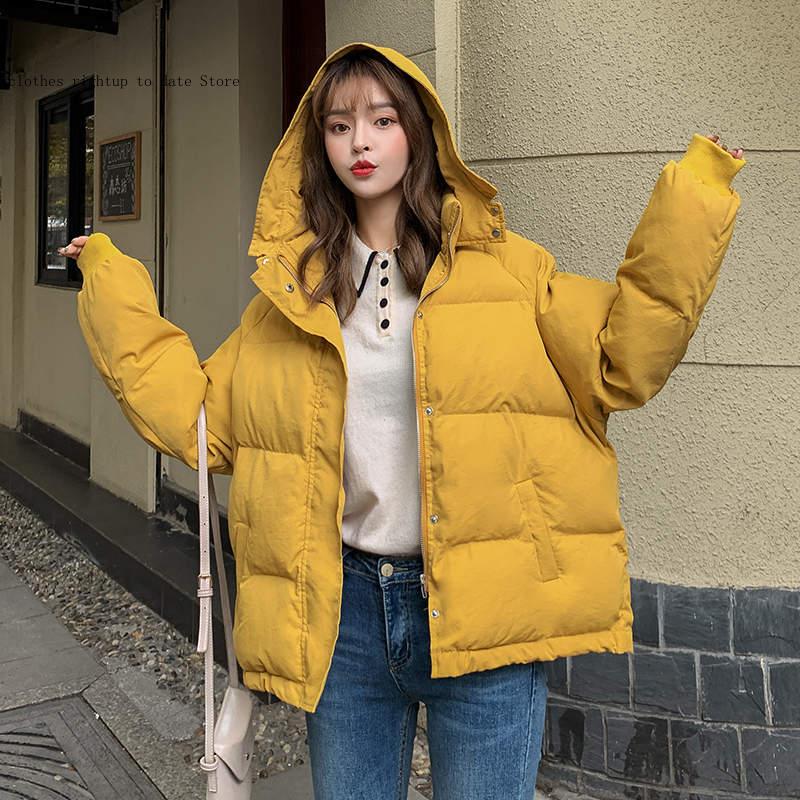 冬のジャケットの女性黄色のパーカー韓国のファッションフード付きルーズショート厚みダウン綿コート女性学生パッド入り