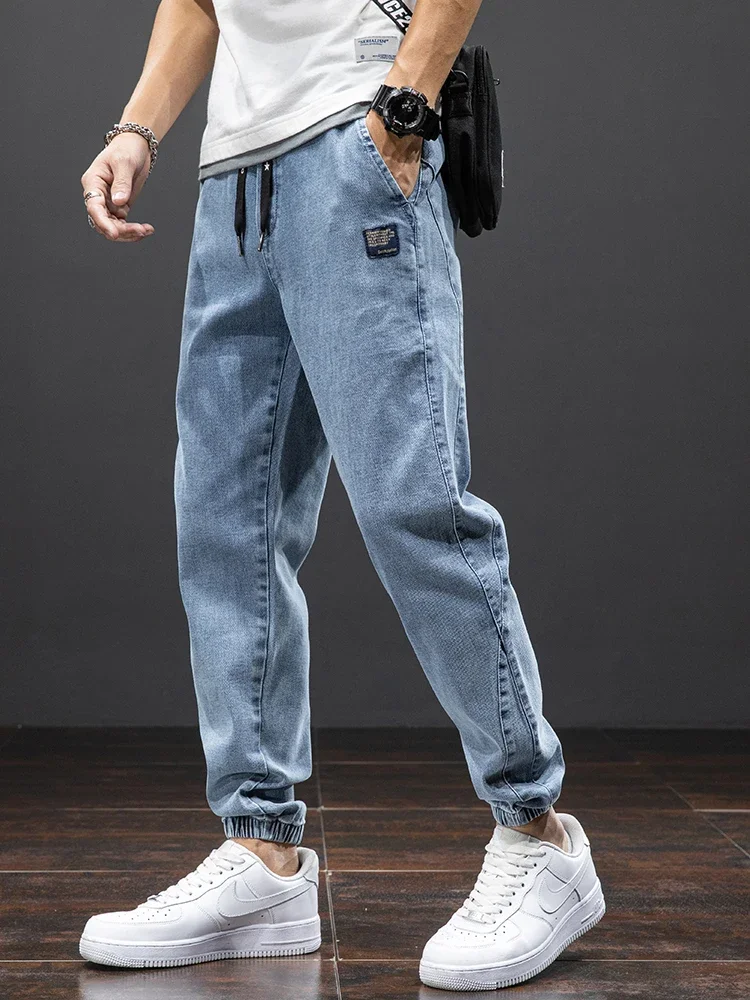 プラスサイズ 7XL 8XL 春夏カーゴジーンズ男性ファッションストリートデニムパンツだぶだぶカジュアルジョガーハーレムジーンズズボン男性