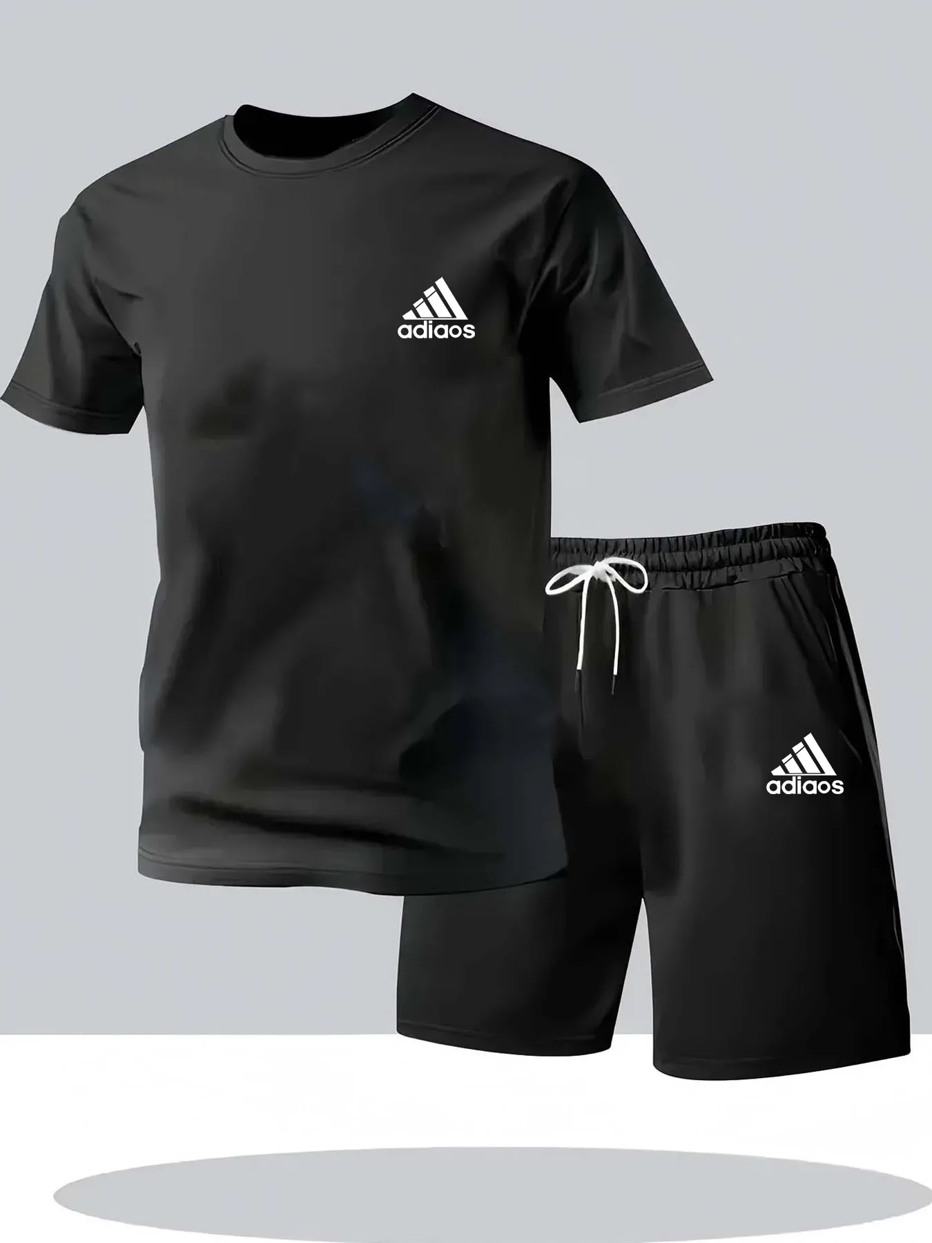 新しい夏のメンズフィットネススポーツウェア、半袖Tシャツとショートパンツの2点セット、通気性と速乾性のあるカジュアルウェア。
