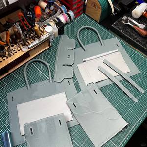 完全手作りのオーダーメイド高級デザイナーブランドの金具。25枚のトーゴ産エプソム本革を使用。レディースハンドバッグ、レディースバッグ