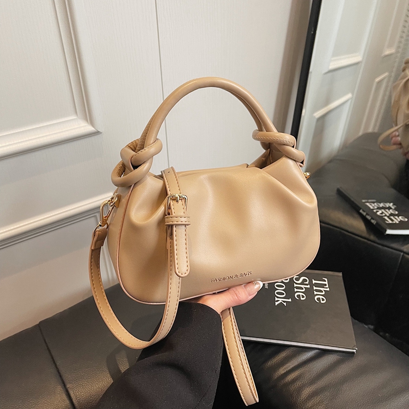 新しい女性ソリッドカラー Lnclined ショルダーバッグブランドデザイナージッパーハンドバッグ女性のファッションショルダーバッグ Pu レザーカジュアルホーボーバッグ