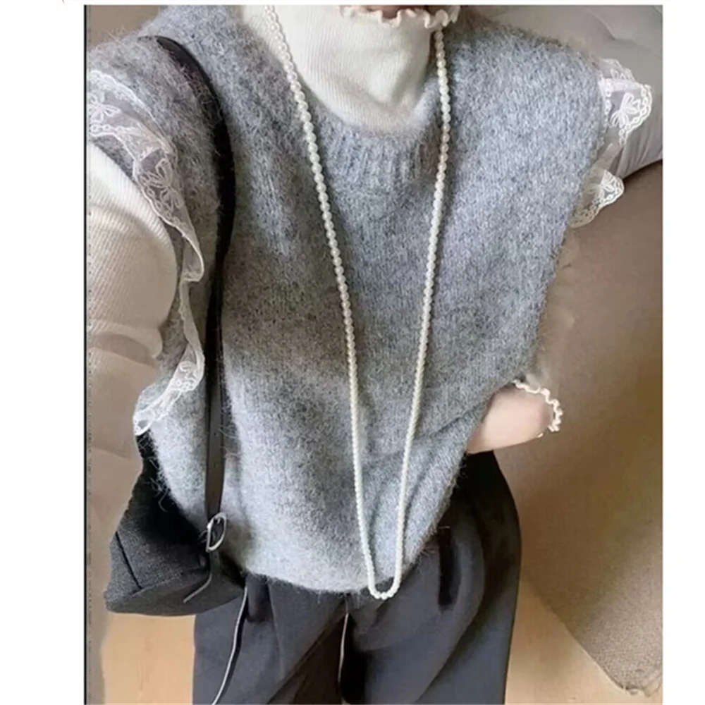 ヴィンテージノースリーブ春秋のファッション婦人服ルーズ O ネックパッチワークベストニットレースコートオールマッチ韓国新しいセーター