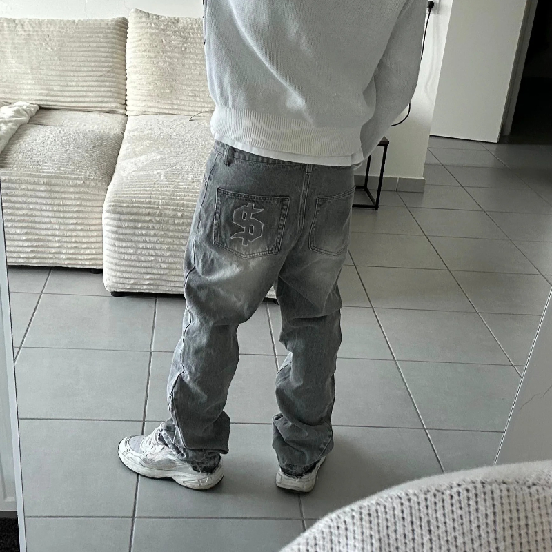 ドル柄刺繍レトロジーンズ男性 Y2K スプライスヒップホップだぶだぶのパンツゴシックストリートファッションローライズジーンズ服新しい