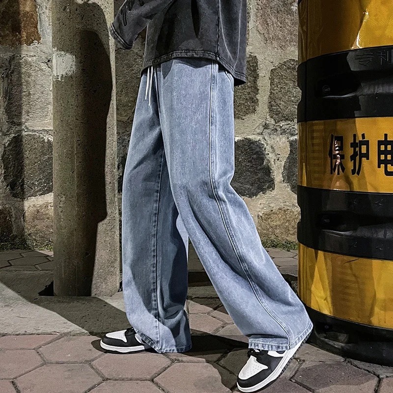 韓国スタイルのメンズジーンズストレートレッグルーズフィットワイドパンツカジュアルパンツ春秋のトレンディなお父さんパンツと編組ロープディテール