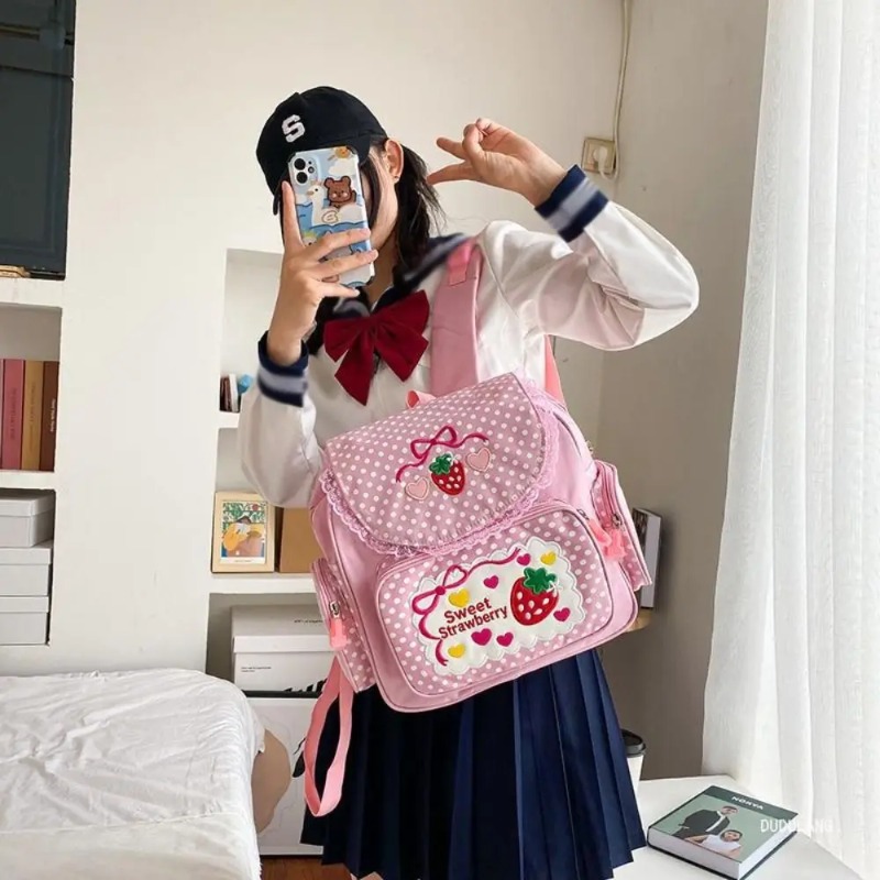 ピンク刺繍イチゴ子供のランドセル学生誕生日ギフト 2026 新ファッションかわいい漫画ピンクのバックパックブックバッグ