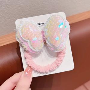 女の子向けの、スパンコールとリボンが付いた、安価で高品質なポニーテール用ヘアバンド。小さな女の子や女性にぴったりの、かわいいプラスチック製のヘアアクセサリーです。