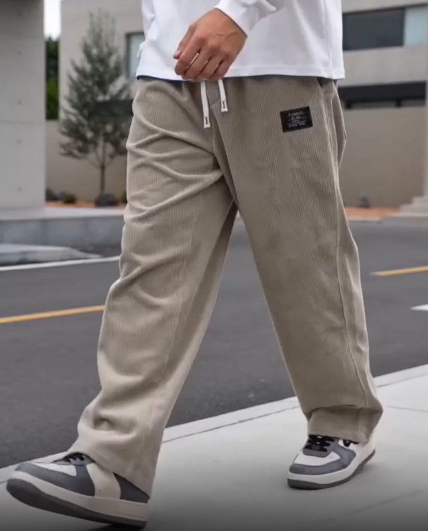 男性コーデュロイワイドレッグパンツ弾性巾着ウエストルーズストレートパンツカジュアルストリートラベル装飾長ズボン