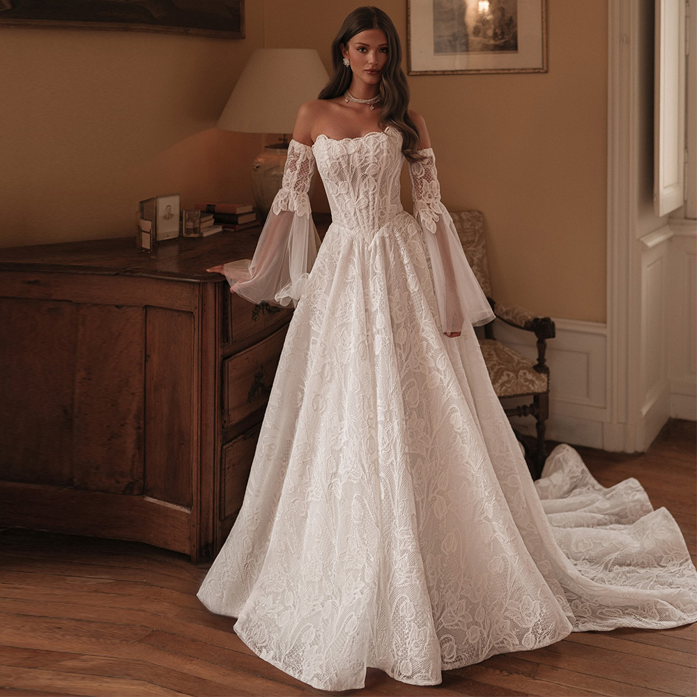ファッションノースリーブストラップレス Vestido デノビアカスタマイズされたロマンチックなアップリケレースのウェディングドレスクラシック A ラインローブデマリー