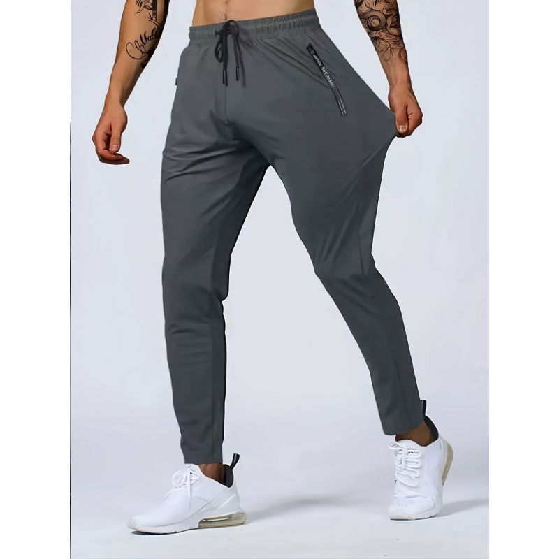 ジム服男サッカーフィットネス高弾性巾着スウェットパンツパジャマパンツランニングトレーニングジョギング釣りルーズメンズ