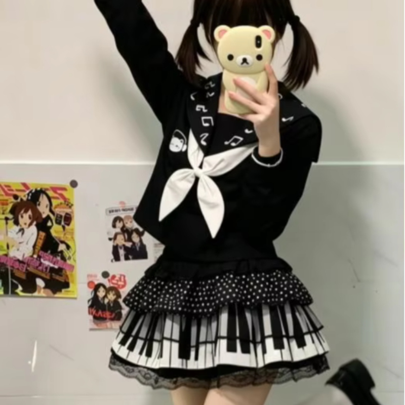 原宿サブカルチャーパンクレトロ黒と白のピアノキー白水玉レースステッチスカートセクシーなフリルウエストスカート女性