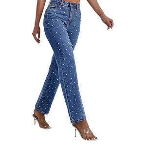 High-quality women's pearl-embellished jeans with full crystal detailing, a stylish, flattering fit, and stretch