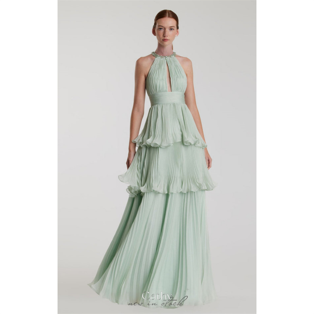 Cathy カスタマイズされたグリーン O ネック多層プリーツプロムドレス A ラインノースリーブ Vestidos de noiva カットアウトバックレスフォーマルイブニング