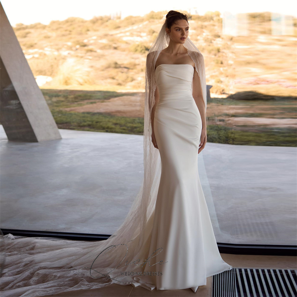 QICHE エレガントなストラップレスマーメイドウェディングドレス女性スパンデックスプリーツオープンバックノースリーブ Vestidos デノビアブライダルドレスカスタマイズ
