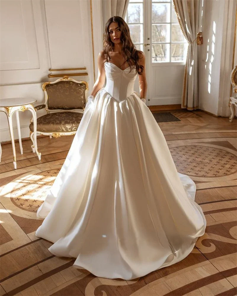 Flavinke カスタマイズされた恋人プリンセス A ラインのウェディングドレスサテンノースリーブブライダルドレス女性の結婚式 Vestidos De Noiva