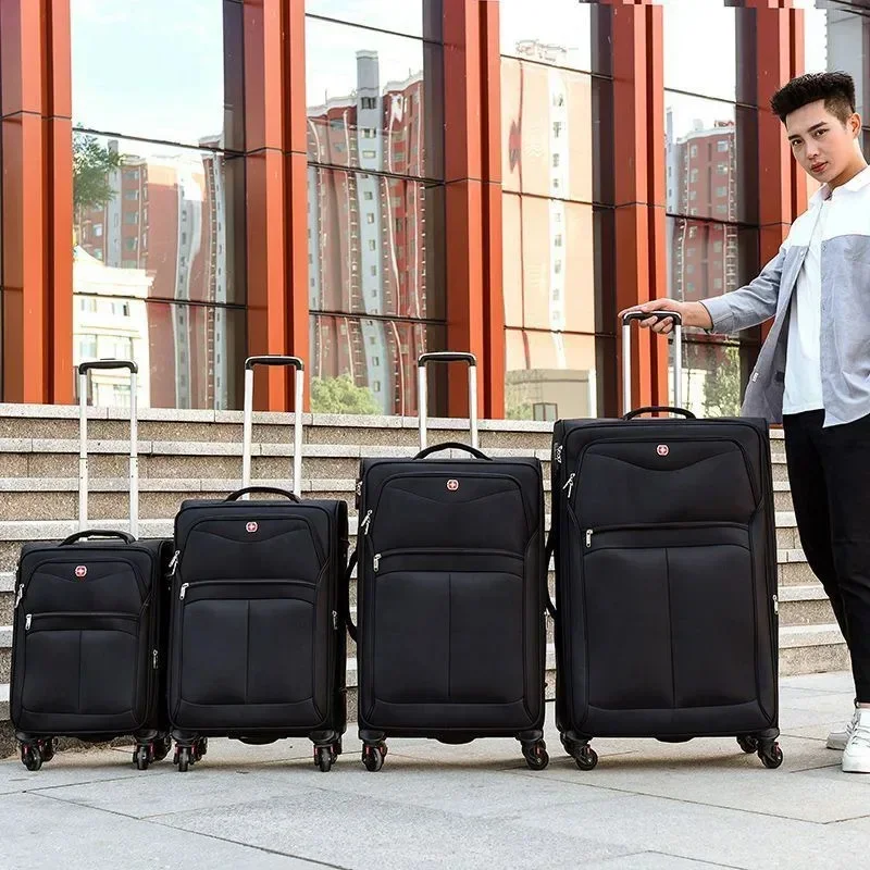 TRAVEL TALE 20 "24" 28 "32" インチ拡張可能なオックスフォード防水旅行スーツケースソフト大型トロリーローリング荷物バッグ車輪の上