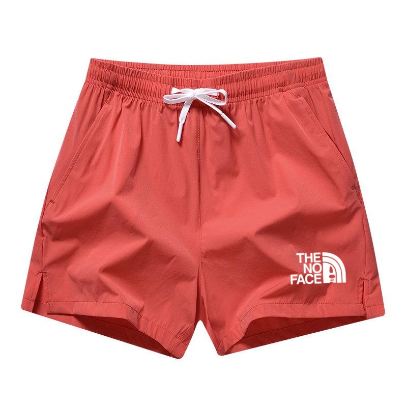 2026 夏の熱い販売スポーツショーツランニングパンツ男性と女性のジッパーポケットカップルショーツビーチ水泳ショーツ