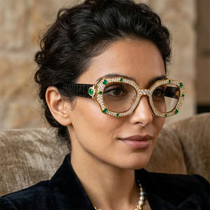 Luxury custom-made jewelry eyewear: women's optical frames in metal and acetate, set with turquoise gemstones and featuring metal accents