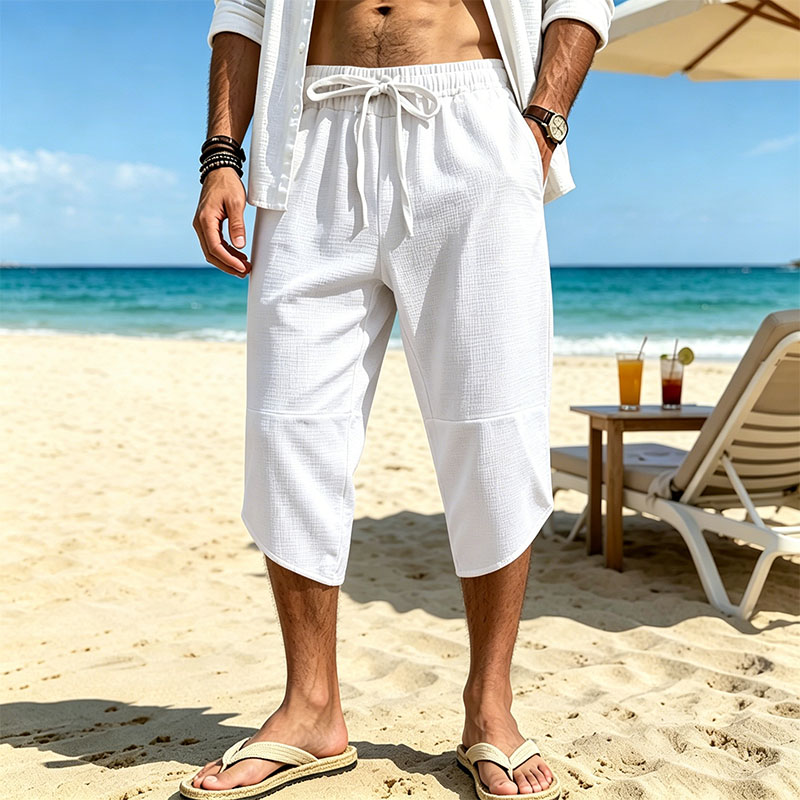夏新メンズテクスチャールーズクロップドパンツショーツ男性弾性ウエスト巾着 3/4 長さクロップドパンツだぶだぶのスウェットパンツ