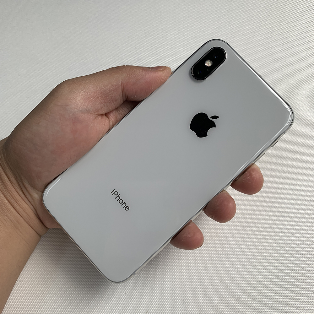 オリジナルロック解除 Apple iPhone X 4 グラム携帯電話 NFC 3 ギガバイト RAM 64 ギガバイト 256 ギガバイト ROM 5.8 "OLED スクリーン 12MP * 2 7MP A11 ヘキサコア iphone x