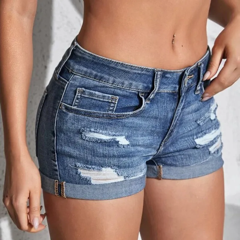 女性のスプリットデニムショーツ夏のビーチワイルドファッションセクシーなミッドウエストカール袖口穴あき弾性スリムフィットカジュアルショーツ