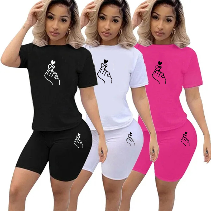 女性ソリッドスポーツカジュアルツーピースセット半袖 Tシャツトップバイカーレトロショーツプリントパンツガールトラックスーツゴシック衣装