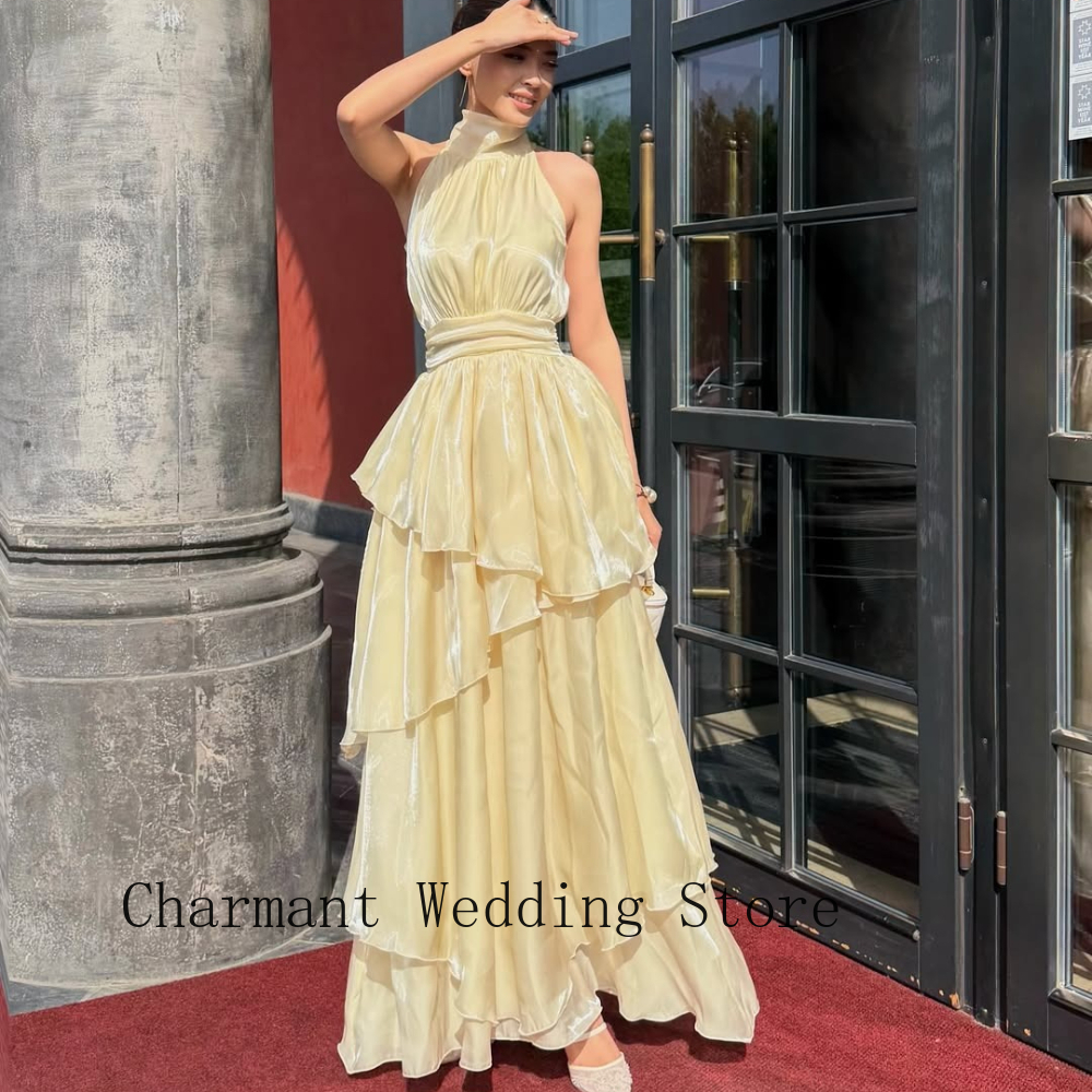 Yellow Formal Evening Gown with Halter Neck, Tiered Layered Skirt, Sleeveless Design and Flowing Silhouette for Cocktail Parties