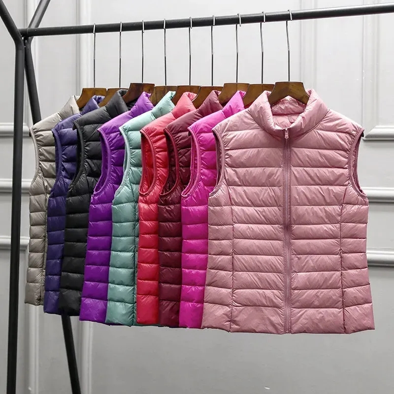 超軽量ダウンベスト女性 2026 新しいノースリーブジャケット女性ホワイトダックダウンチョッキ女性暖かいフグジャケット生き抜く M-8XL